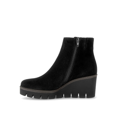 Bottines compensées noires en cuir velours