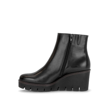 Bottines compensées noires en cuir lisse